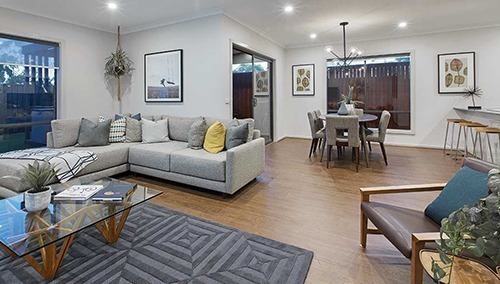 Interior image of lounge and dining from Heartland Estate display